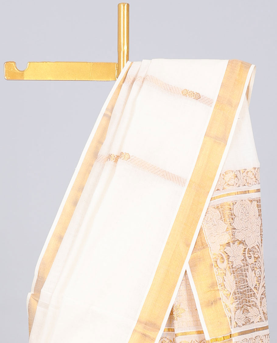 Cream kerala saree with zari stripes, zari border & pallu of floral designs in zari