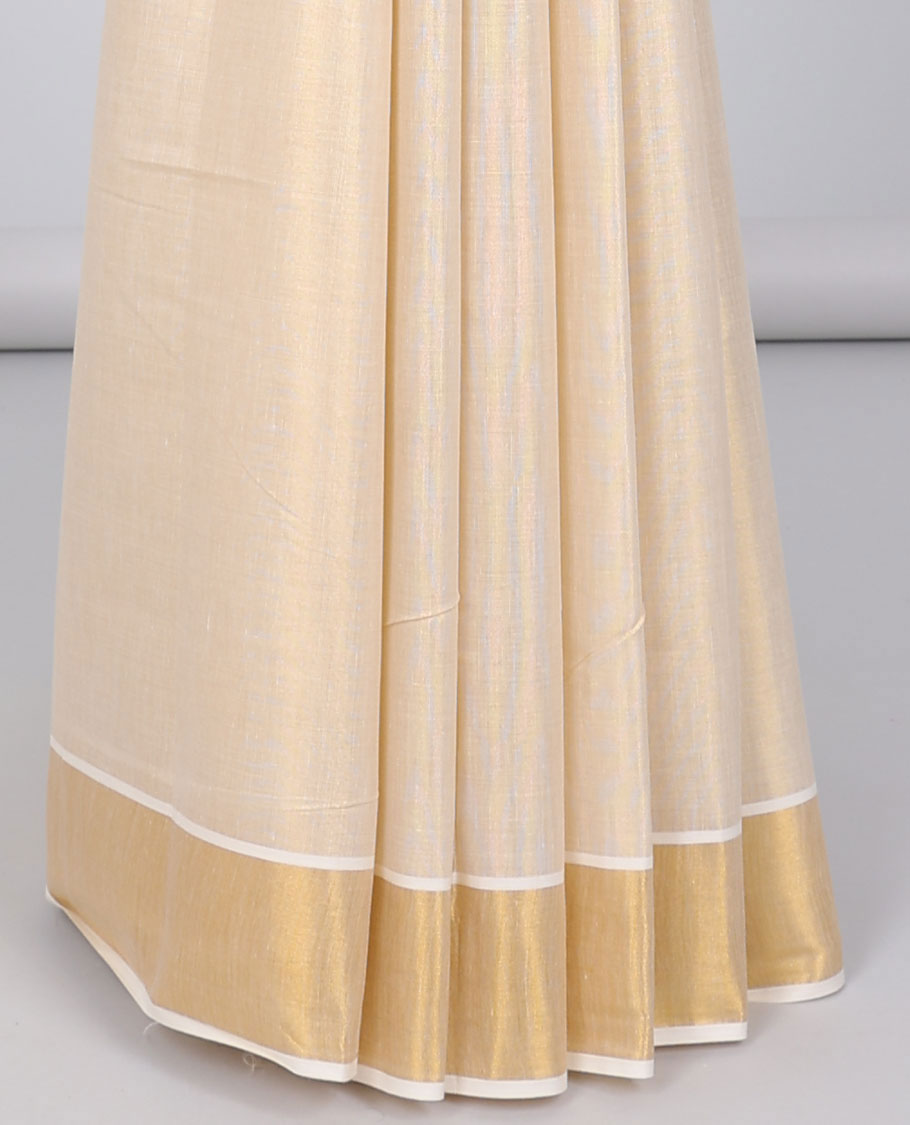 Gold leaf embroidered motifs kerala saree, zari border &  floral creeper & peacock feather embroidered pallu