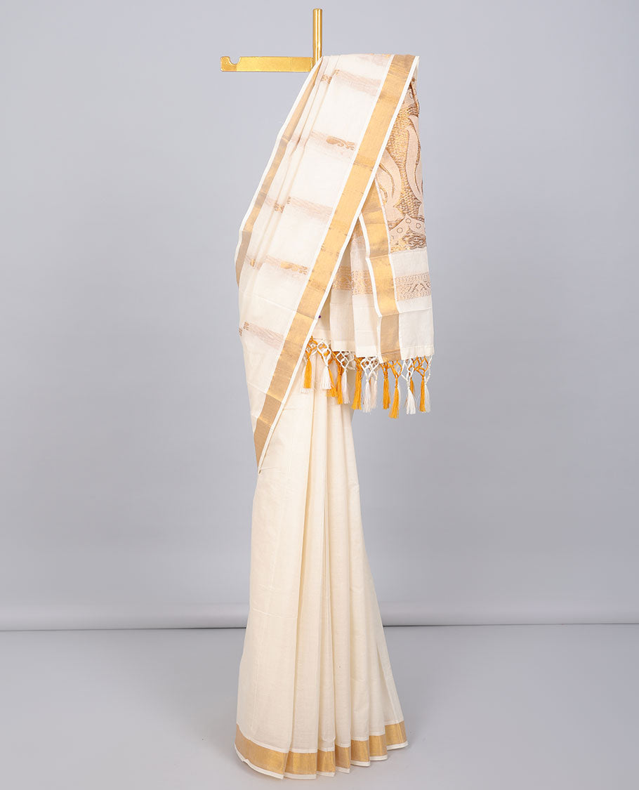 Cream kerala saree with zari designs, zari border & pallu of intricate designs in zari