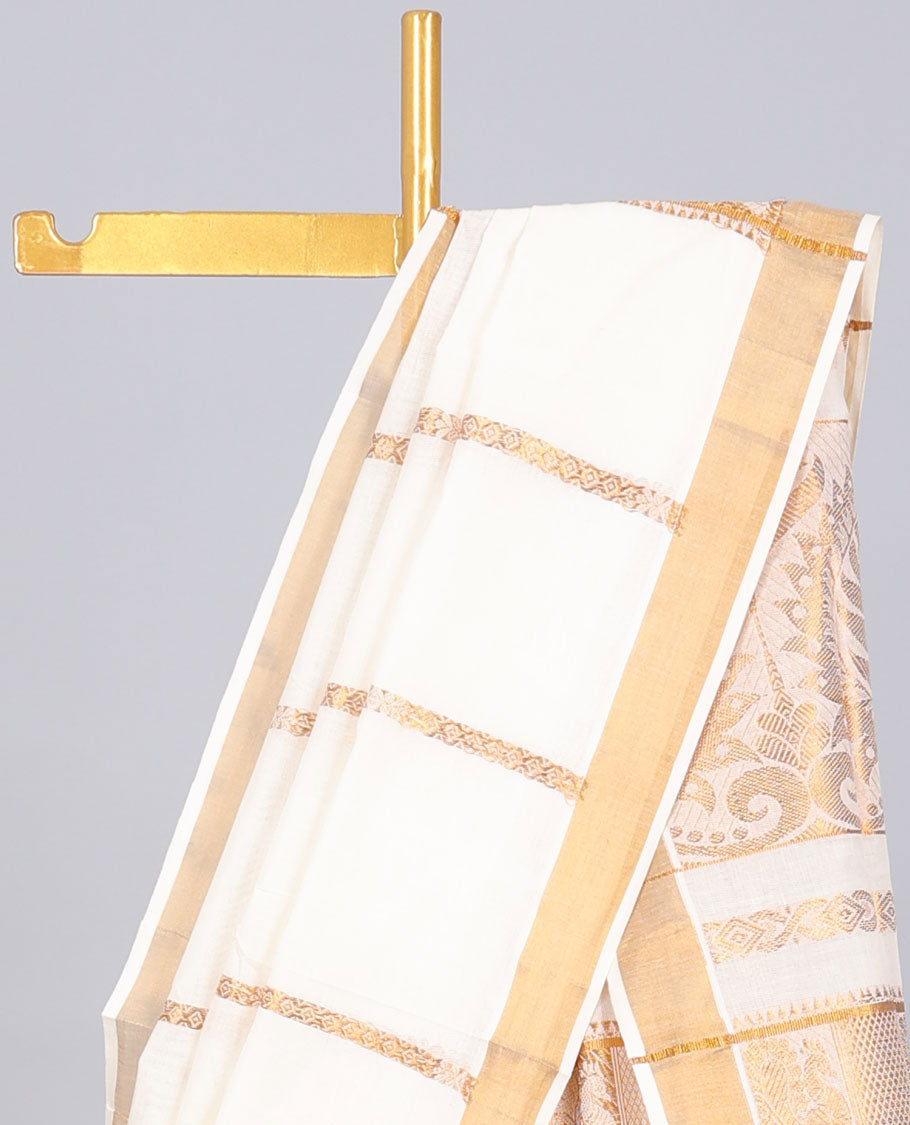 Cream kerala saree with zari designs, zari border & pallu of traditional designs in zari