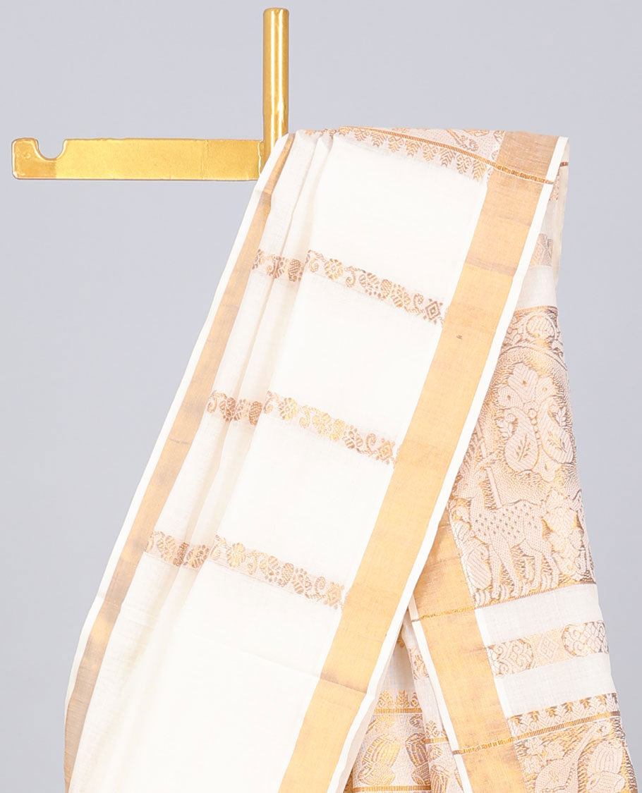 Cream kerala saree with zari designs, zari border & pallu of traditional designs in zari