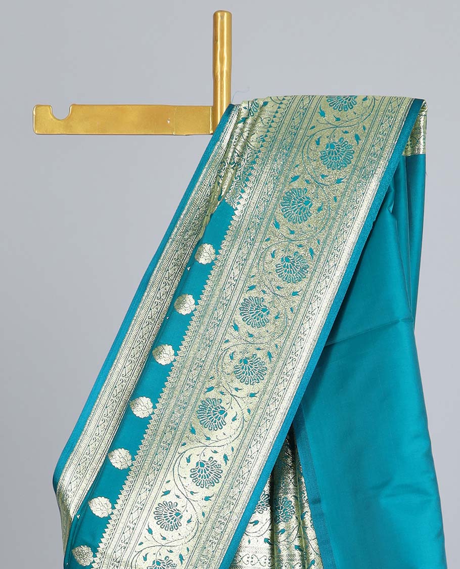Blue semi-banaras satin saree with buttas, traditional design zari border & pallu of intricate designs