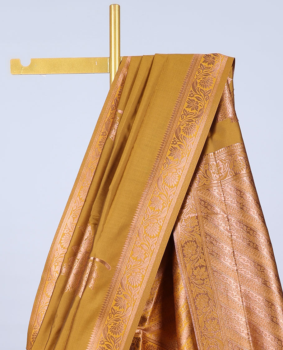 Mustard butter silk saree with zari buttas, floral creeper zari border & pallu of diagonal floral creeper design
