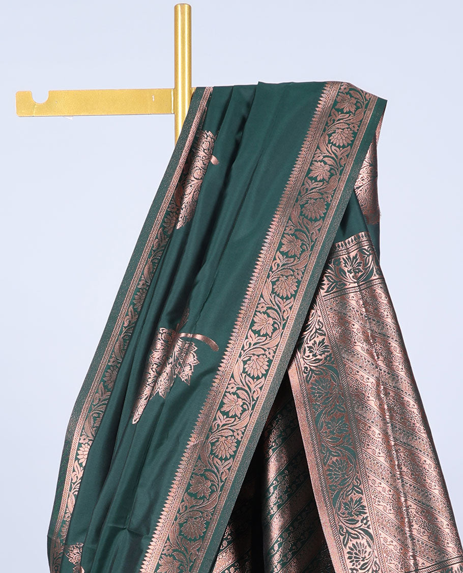 Green butter silk saree with zari buttas, floral creeper zari border & pallu of diagonal floral creeper design