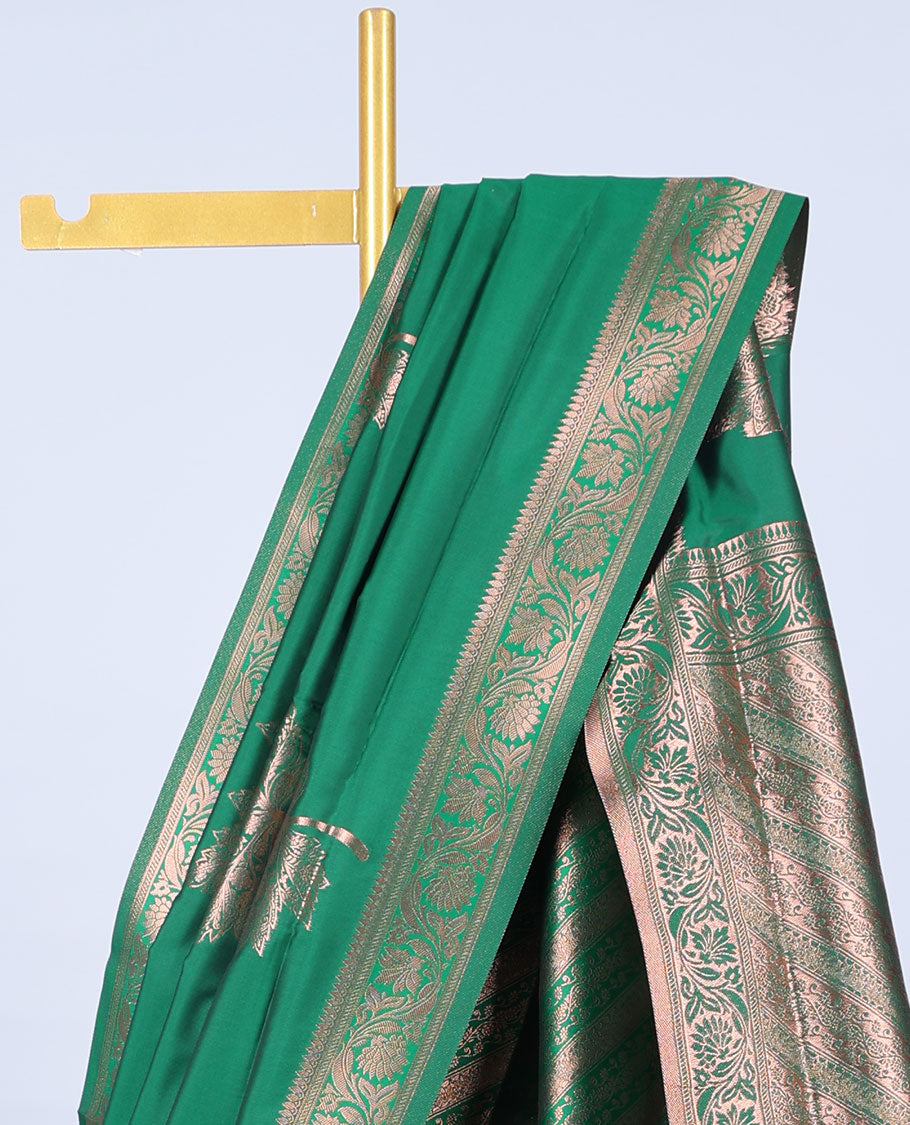 Green butter silk saree with zari buttas, floral creeper zari border & pallu of diagonal floral creeper design