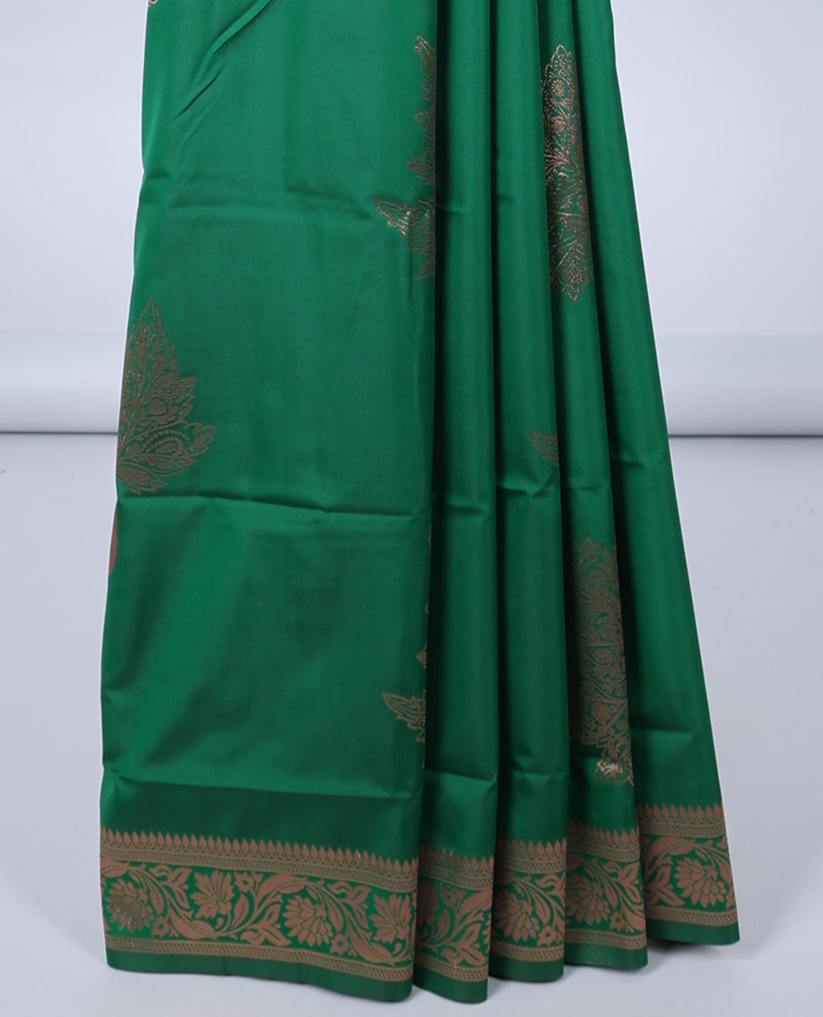 Green butter silk saree with zari buttas, floral creeper zari border & pallu of diagonal floral creeper design