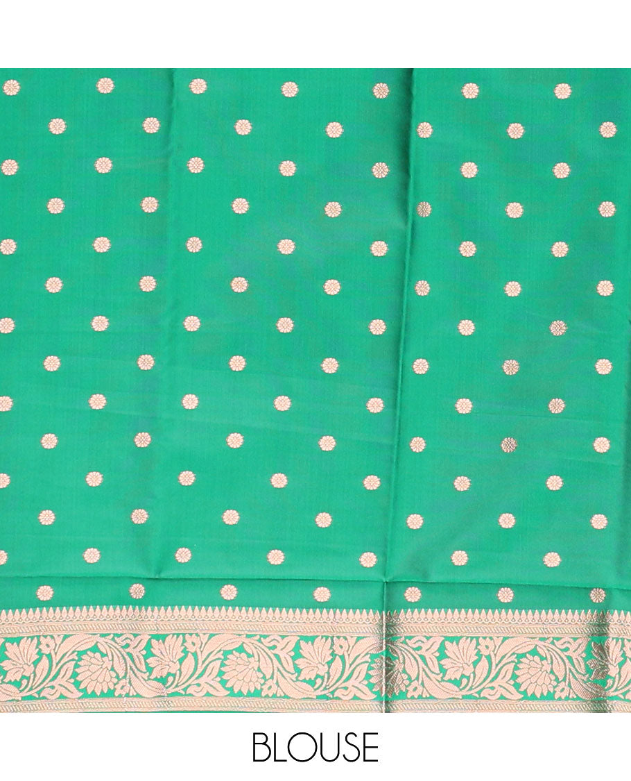 Green butter silk saree with zari buttas, floral creeper zari border & pallu of diagonal floral creeper design