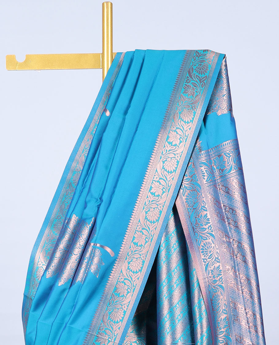 Blue butter silk saree with zari buttas, floral creeper zari border & pallu of diagonal floral creeper design