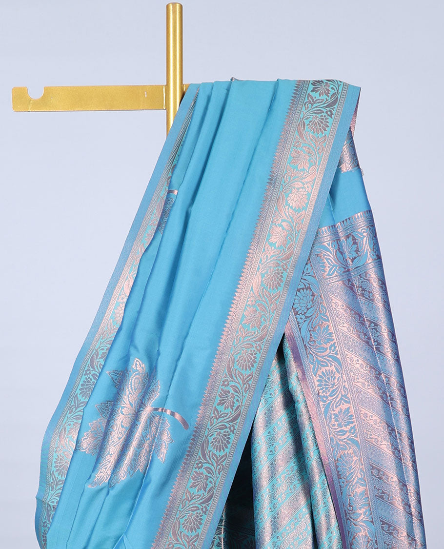 Blue butter silk saree with zari buttas, floral creeper zari border & pallu of diagonal floral creeper design