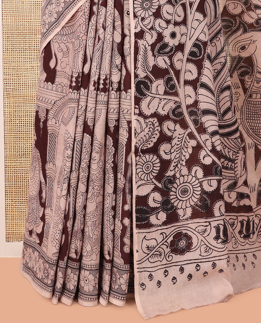 Brown Kalamkari Cotton Saree, Accentuated with Ancient Human Motif Print,  Complemented By Printed Border, Kalamkari Peacock Motifs Pallu, and a Contrast Blouse