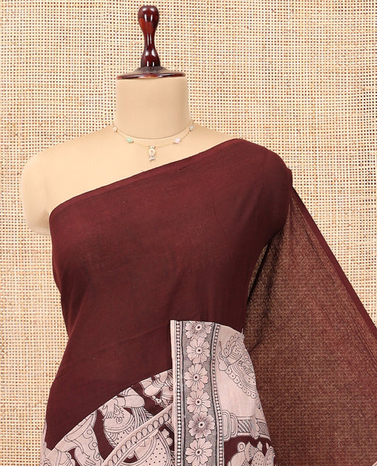 Brown Kalamkari Cotton Saree, Accentuated with Ancient Human Motif Print,  Complemented By Printed Border, Kalamkari Peacock Motifs Pallu, and a Contrast Blouse
