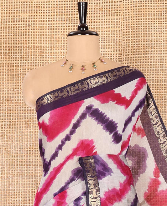 Purple Muslin Cotton Saree Adorned with Zig-Zag Shibori Patterns Prints, Complemented by a Contrast Border of Deer Motifs in Zari, Pallu Decked Up with Scenery Print, and Paired with a Contrast Polka Dots Printed Blouse