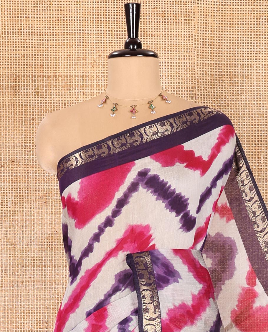 Purple Muslin Cotton Saree Adorned with Zig-Zag Shibori Patterns Prints, Complemented by a Contrast Border of Deer Motifs in Zari, Pallu Decked Up with Scenery Print, and Paired with a Contrast Polka Dots Printed Blouse