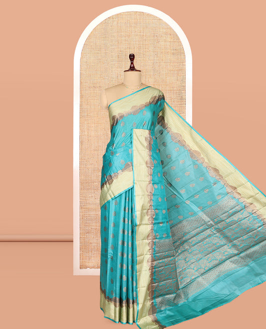 Blue Tusser Silk Saree, Ornamented with Zari Buttas, a Contrast Zari Border, Grandly Decked Up Pallu, and a Matching Blouse