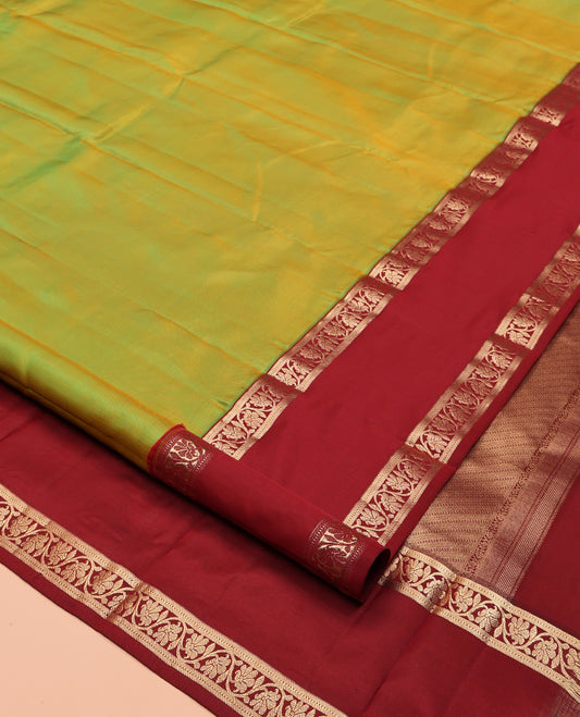 Green Plain Kanchipuram Silk Saree, Complemented by a Contrast Rettai Pettu Border of Kodi Visiry Designs, Grand Pallu, and a Contrast Blouse