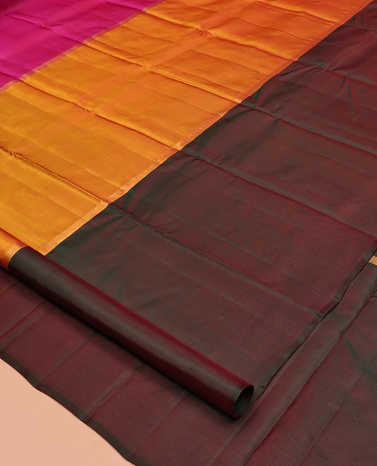 Borderless Multi-Colored Kanchipuram Silk Saree, Delicately Woven with Two-Horizontal Zari Stripes Running on Its Body, a Plain Pallu, and Paired with a Contrast Blouse