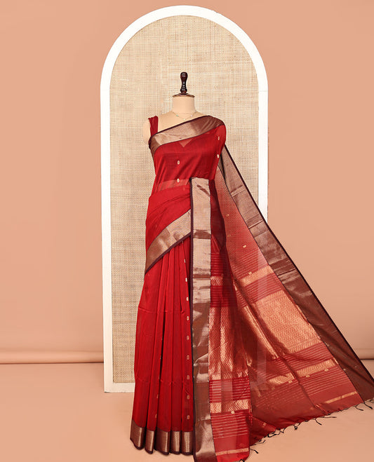 Red Maheshwari Cotton Saree, Spotlighted with Floral Zari Buttas on Its Body, Complemented by a Contrast Chevron Striped Zari Border, Pallu Woven in Chevron Stripes in Zari, and Paired with a Matching Blouse
