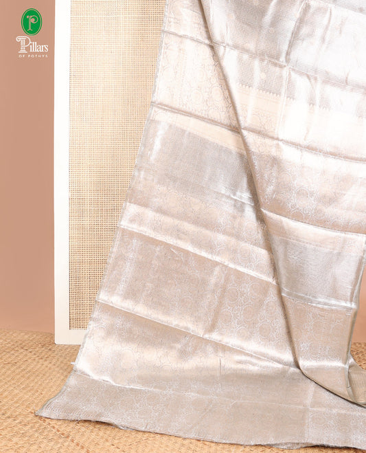 Grey gold zari butta , weaving design banaras kora tissue saree with self jacquard border & rich weaving pallu along with brocade blouse