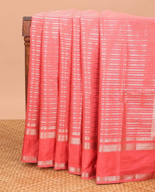 Peach striped floral design tussar silk saree with self intricate zari design border