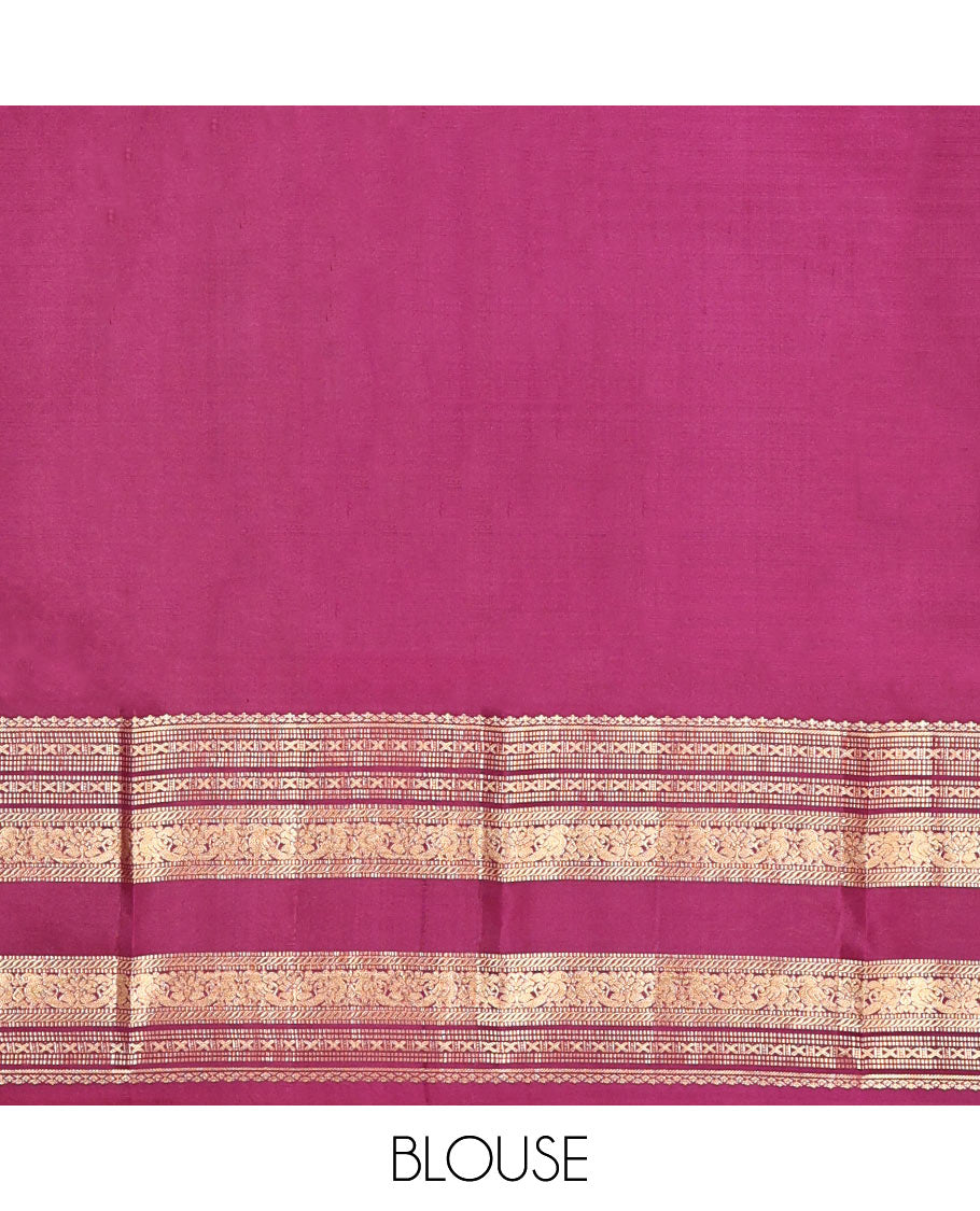 Wine Vasundhara Silk Saree, Woven with Zari Buttas, Highlighted by a Traditional Zari Design Woven Border, Intricate Pallu, and a Matching Blouse