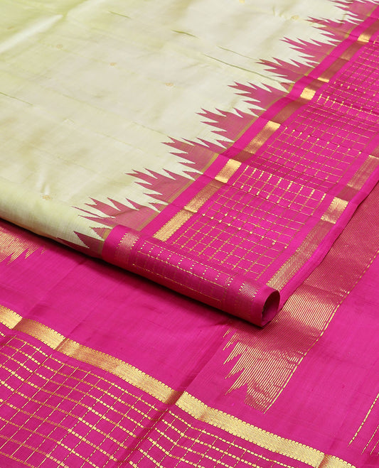 Pale green zari buttas kanchipuram silk saree, contrast one-sided thazampoo rekku muthu kattam border & pallu of zari stripes & thazampoo rekku