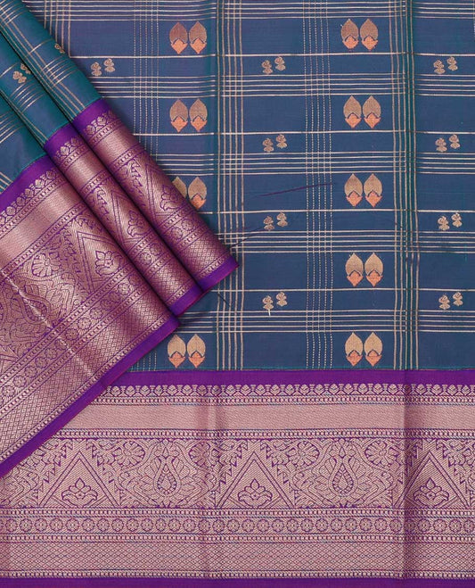 Blue checked, floral design art silk pavadai material with contrast zari design border & zari design blouse