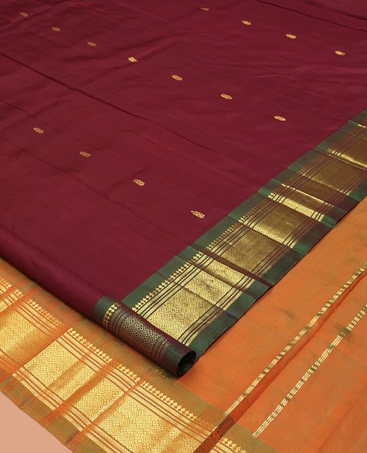 Brown Kanchipuram Silk Saree, Elevated with Zari Buttas, Complemented by a Contrast Border of Panner Sombu, Banaras, Muthu, and Jaal Design, Pallu of Zari Design, and No Blouse