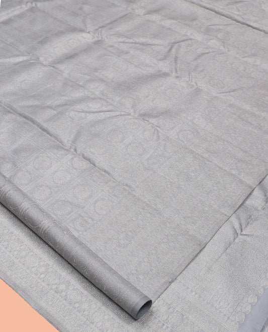 Grey Kanchipuram Wedding Silk Saree Features Chakram Jacquard Design, a Sparsely Woven Zari Border, Ogee Pallu, and a Matching Blouse