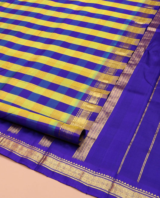 Multi-Color Kanchipuram Silk Saree, Detailed with Checked Design on Its Body, Highlighted by a Zari One-Sided Border of Rekku, Banaras, and Jaal Designs, Pallu of Zari Designs, and Comes Without a Blouse