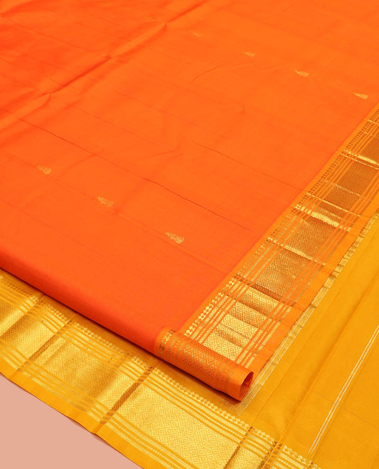 Orange Kanchipuram Silk Saree, Embellished with Zari Buttas, Contrast One-Sided Border of Paneer Sombu, Banaras, Muthu, and Mayil Kann Design, Zari Design Pallu, and No Blouse