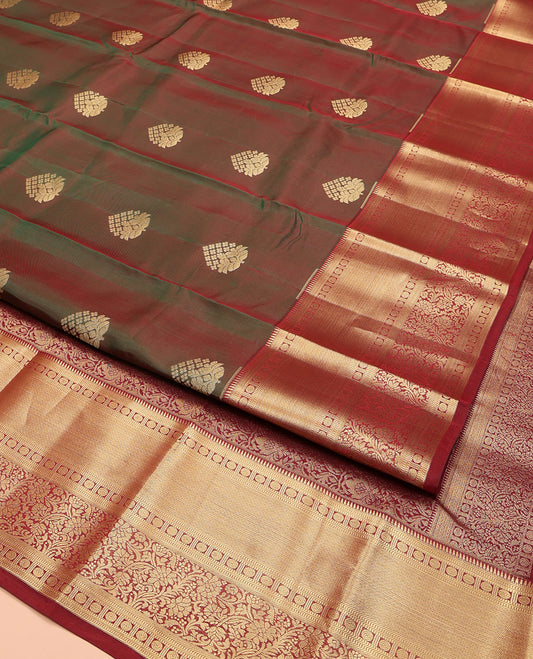 Green Vasundhara Lite Silk Mix Saree, Decorated with Zari Buttas on Its Body, Complemented by a Contrast Border of Rekku, Muthu, Mayil Kann, and Floral Designs, Intricately Designed Pallu, and Paired with a Contrast Blouse