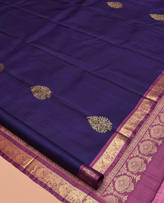 Blue Kanchipuram Silk Saree, Elevated with Zari Buttas All Over Its Body, Complemented by a Contrast Border of Rekku, Muthu, Manga, and Yaanai Designs, Grand Jaal Pallu, and Paired with a Contrast Blouse