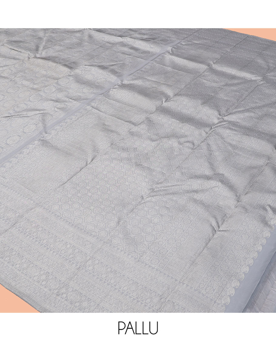 Grey Kanchipuram Wedding Silk Saree Features Chakram Jacquard Design, a Sparsely Woven Zari Border, Ogee Pallu, and a Matching Blouse