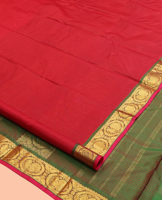 Red Kanchipuram Silk Saree, Elevated with Vazhaipoo Stipes and Zari Buttas, a Contrast Traditional Mayil Motif Border, Pallu of Zari Design, and Contrast Blouse