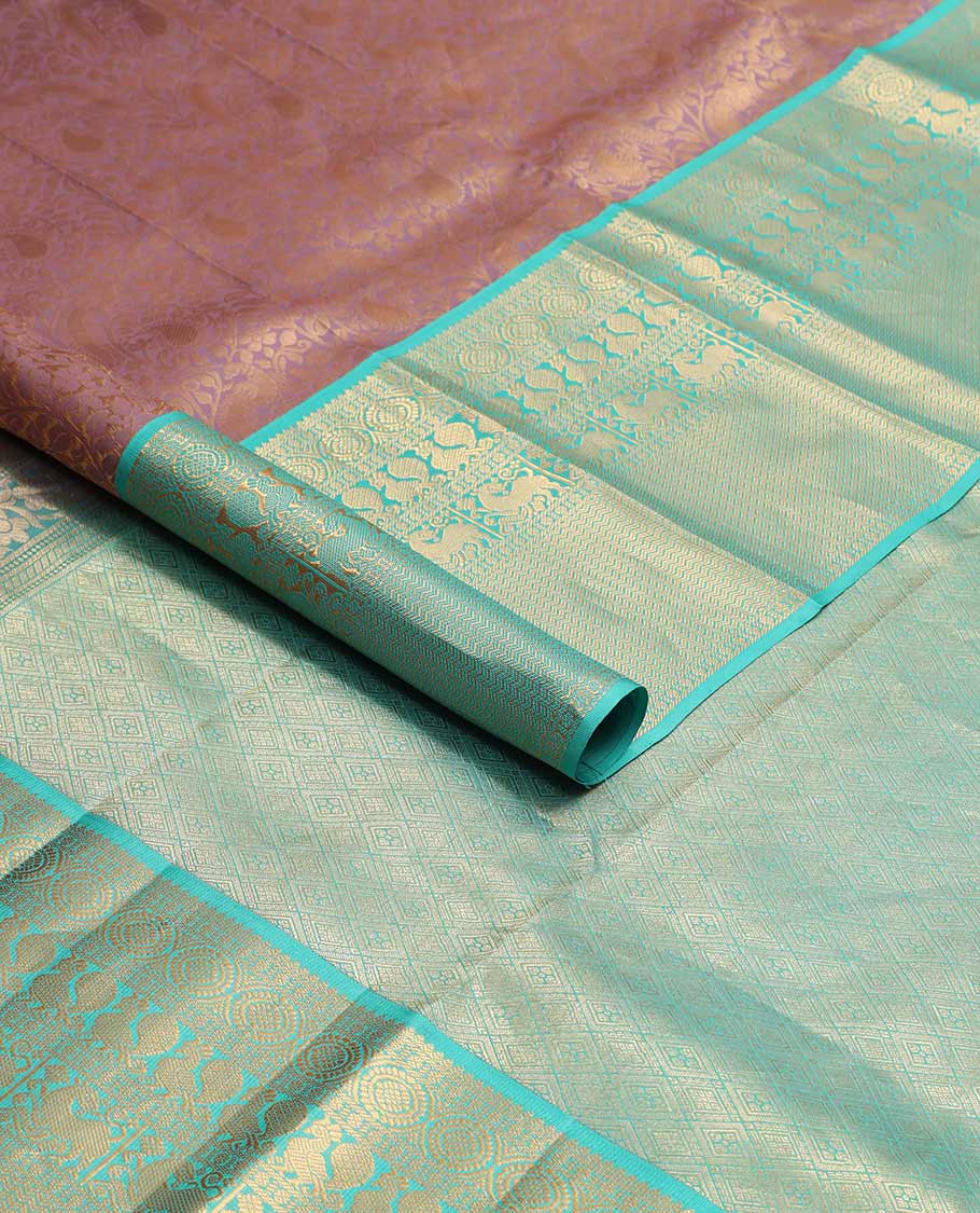 Mauve floral design kancheepuram silk saree with contrast  border of rekku, banaras, poo chakram, mayil design & zari design pallu