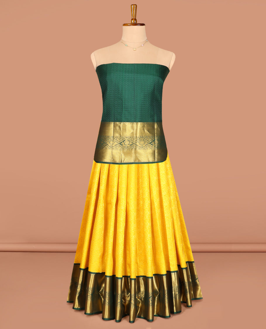 Yellow Pure Silk Half-Saree, Sparsely Woven with Floral Jacquard All Over Its Skirt, Complemented by a Contrast Korvai Border of Thilakam Mokku, Paisa, and Diamond Designs, Paired with a Contrast Blouse, and Comes with a Jaal Design Dhavani