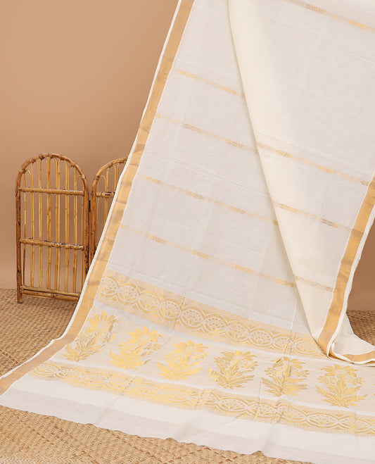 Cream kerala saree with zari stripes, zari border & pallu of floral designs