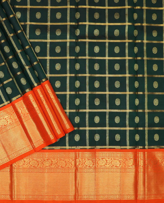 Green pure-silk half-saree, chakram butta enclosed checked skirt, contrast kodi visiry and mayil kann  border, zari design blouse, and manga butta enclosed jaal dhavani