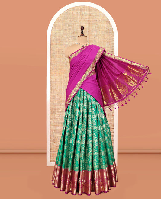Green Art Silk Material Half Saree, Elegantly Framed with Jacquard Skirt, a Contrast Traditional Zari Border, Contrast Blouse, and an Intricate Dhavani