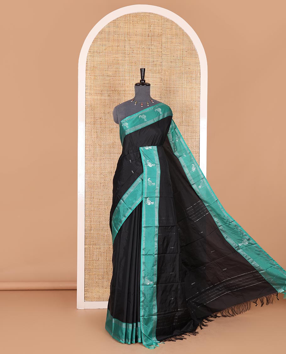 Black zari buttas Kanchi silk saree, contrast peacock motifs zari green border, zari design pallu, and a matching blouse