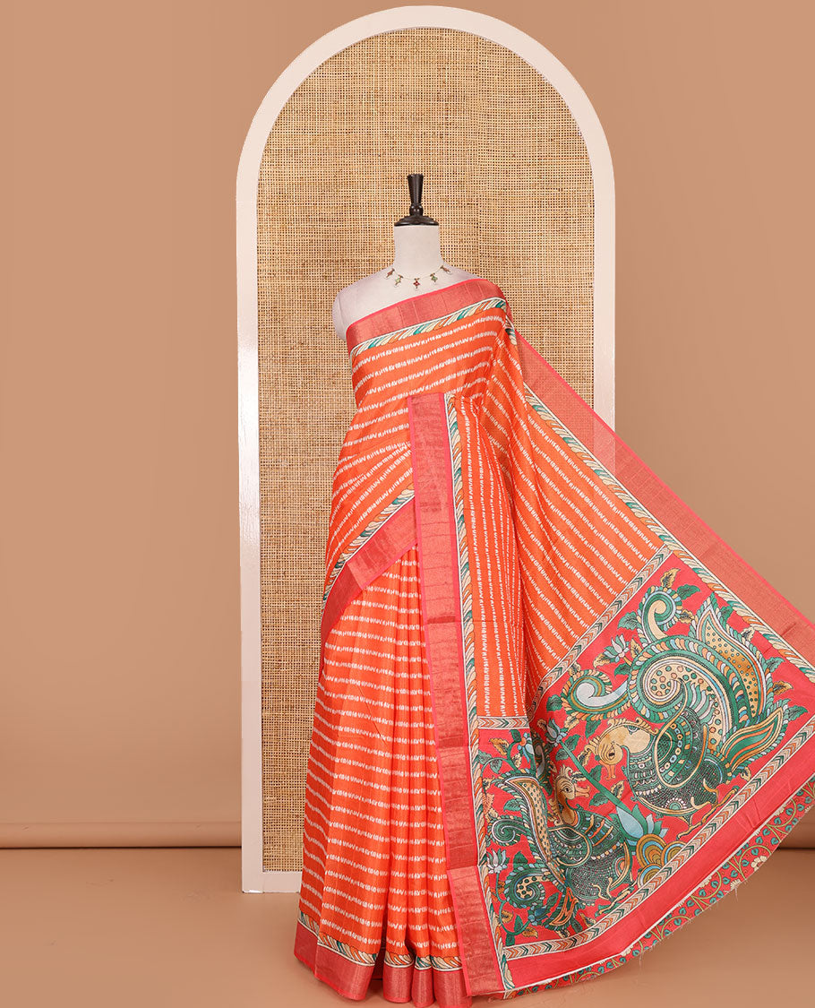 Orange shibori-style printed soft-tussar saree, contrast zari border, kalamkari peacock printed pallu & kalamkari floral vine print contrast blouse