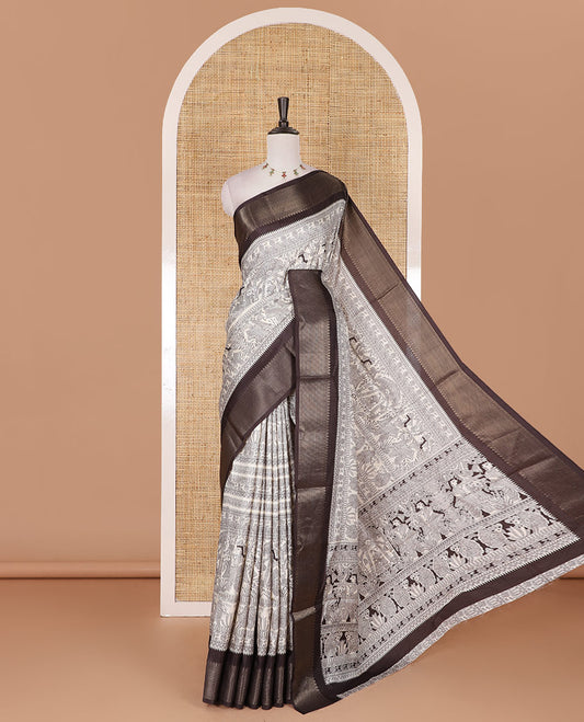 Cream and black Madhubani village theme characters printed soft tussar saree, contrast traditional zari border, Madhubani printed pallu, and a matching blouse