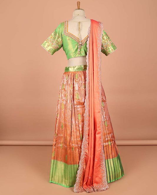 Orange floral jacquard semi-stitched half saree with contrast zari border, embroidered blouse & scallop border dhavani