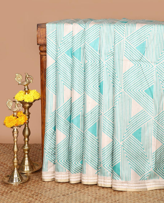 Chikku color with green block geometric print fancy tussar silk saree with zari resam border & block print pallu along striped blouse