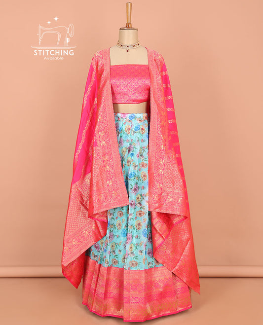 Blue floral printed art silk half saree, contrast traditional design border, jacquard blouse & intricate dhavani