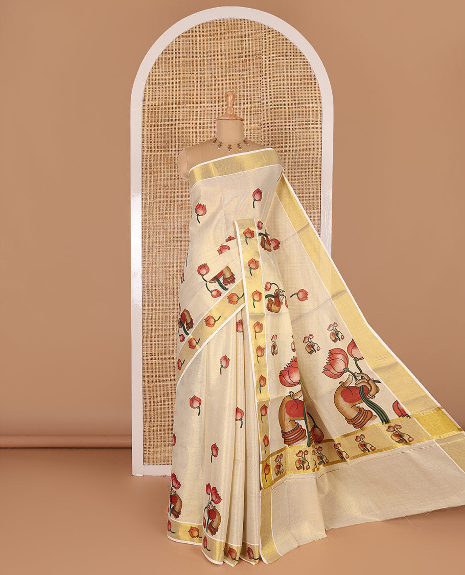 Gold-red pichwai lotus printed Kerala cotton saree, gold zari with lotus printed border, pallu features hand-holding lotus motifs, and lotus printed blouse