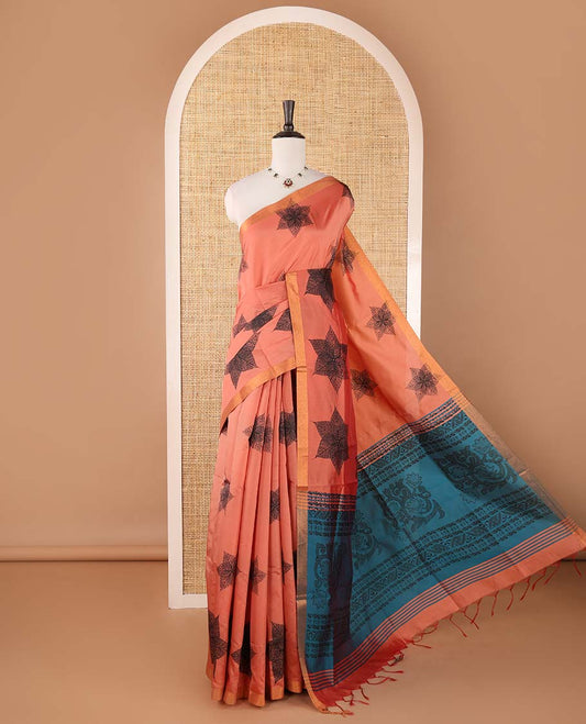 Pink six-petal-like leaf motifs printed micro-silk saree, copper zari border, contrast intricate pallu & plain blue blouse