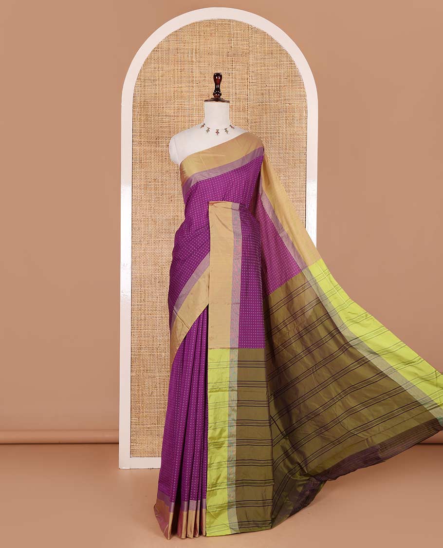 Purple-green plus-shaped buttas steeped semi-soft silk saree, contrast satin border of stripes, striped pallu, and contrast blouse