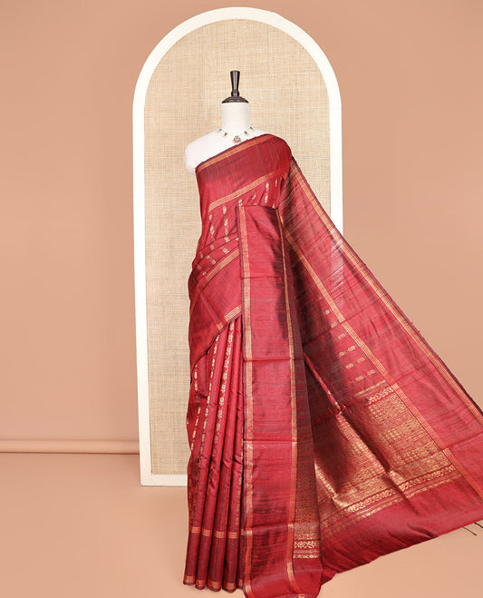 Red Dupion Silk Saree, Richly Detailed with Floral Buttas All Over Its Body, Complemented by a Zari Striped Border, Sparsely Woven Pallu of Intricate Geometric Patterns, and Paired with a Matching Blouse