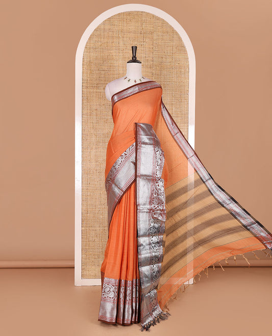 Orange plain mercerised cotton saree, contrast traditional zari border of elephant and peacock designs, striped pallu, and plain blouse